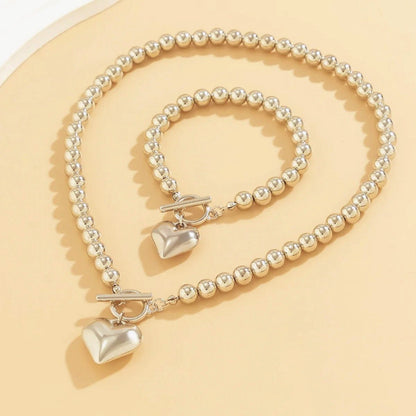 Set de Collar y Pulsera con Corazón de Cuentas