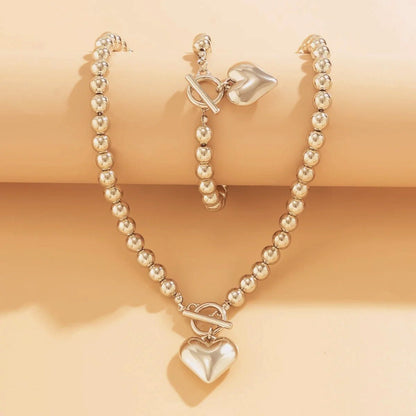 Set de Collar y Pulsera con Corazón de Cuentas